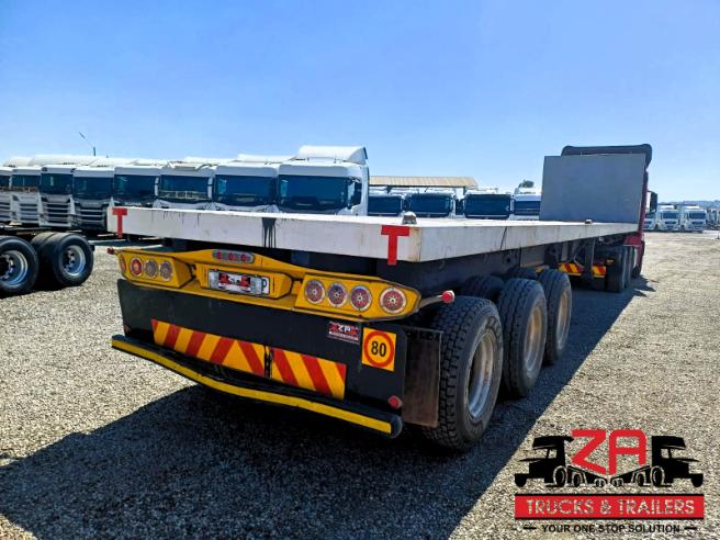 2014 HENRED FRUEHAUF TRI-AXLE FLAT DECK TRAILER #53212